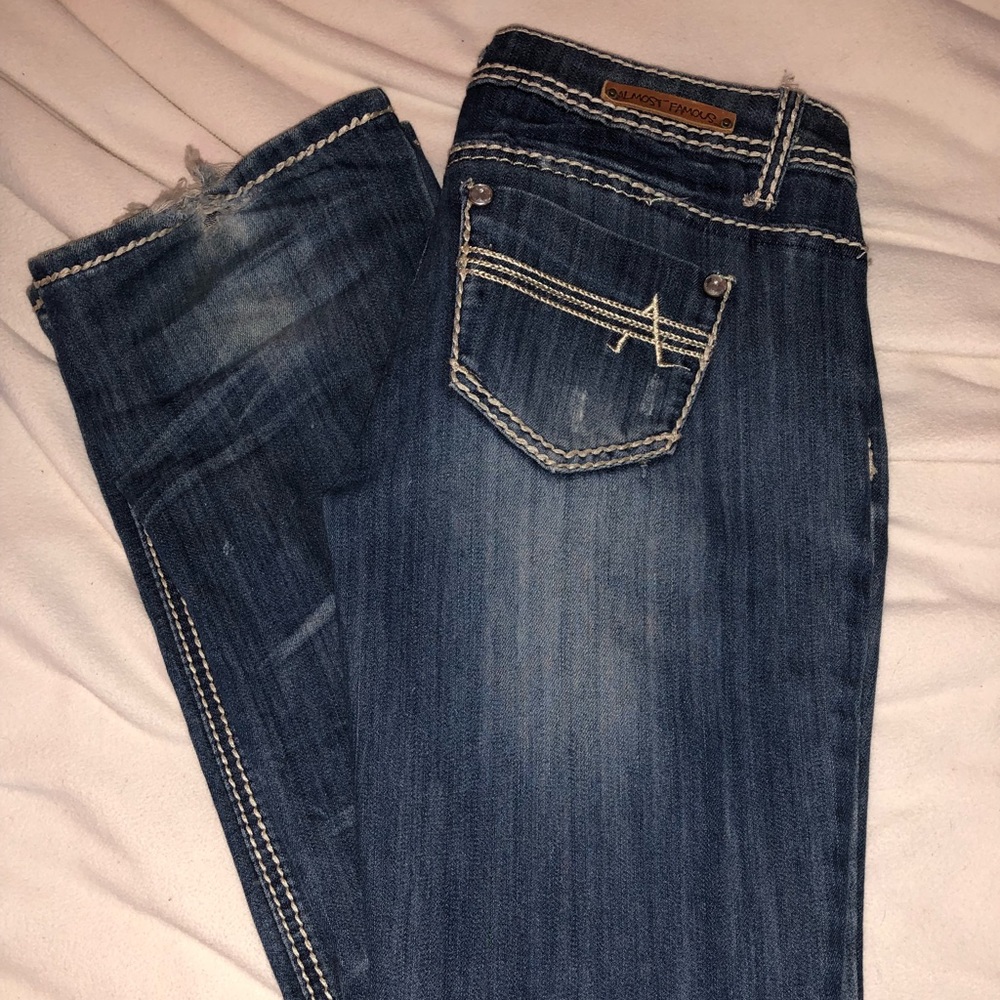 pair of almost famous jeans